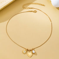 Celestial Heart and Starburst Charm Necklace