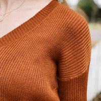Orange ribbed v-neck sweater
