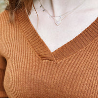 Orange ribbed v-neck sweater